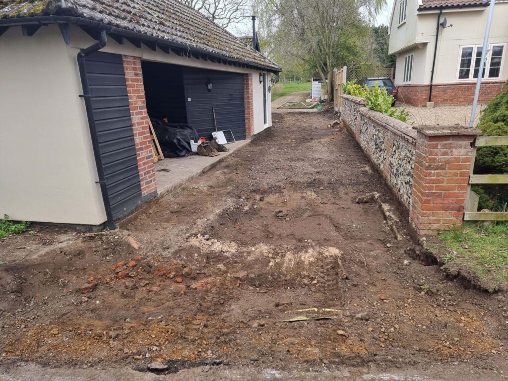 This is a tarmac driveway that is in the process of being dug out and installed by Halesworth Driveway Contractors